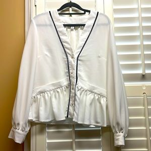 White blouse with gold buttons